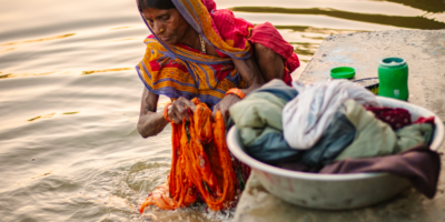 A woman washes laundry at a local pond in the Sarlahi district of southern Nepal. Photo: Vision 360 for IWMI